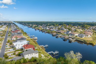 This exquisite single-level home on a pristine lake lot in the on Myrtlewood Golf Course and Club  in South Carolina - for sale on GolfHomes.com, golf home, golf lot