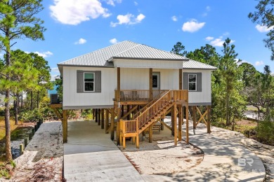 Welcome to your dream coastal retreat in the serene Fort Morgan on Kiva Dunes Golf Club in Alabama - for sale on GolfHomes.com, golf home, golf lot