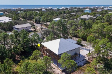 Welcome to your dream coastal retreat in the serene Fort Morgan on Kiva Dunes Golf Club in Alabama - for sale on GolfHomes.com, golf home, golf lot