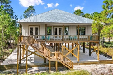 Welcome to your dream coastal retreat in the serene Fort Morgan on Kiva Dunes Golf Club in Alabama - for sale on GolfHomes.com, golf home, golf lot