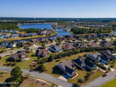 Step into luxury with this stunning 4-bedroom, 3-bathroom on Compass Pointe Golf Course in North Carolina - for sale on GolfHomes.com, golf home, golf lot