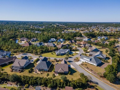 Step into luxury with this stunning 4-bedroom, 3-bathroom on Compass Pointe Golf Course in North Carolina - for sale on GolfHomes.com, golf home, golf lot