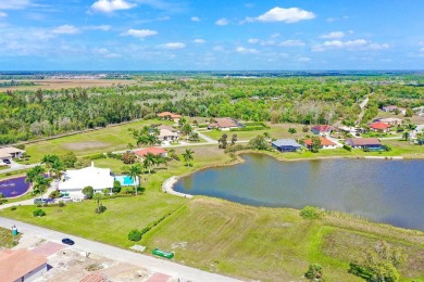Located in the gated community of Royal Palm Golf Estates. Enjoy on Eagle Lakes Golf Club in Florida - for sale on GolfHomes.com, golf home, golf lot