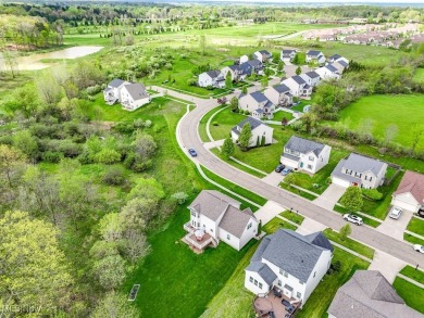 Discover this well-maintained 4 bed, 2 full/2 half bath colonial on Boulder Creek Golf Club in Ohio - for sale on GolfHomes.com, golf home, golf lot