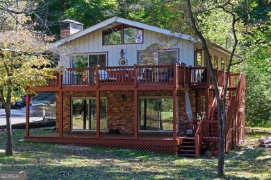 Located on the 17th green of the golf course in the resort-like on Bent Tree Golf Course in Georgia - for sale on GolfHomes.com, golf home, golf lot