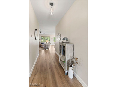 Welcome to this beautifully maintained 2019 single-family home on River Hall Country Club in Florida - for sale on GolfHomes.com, golf home, golf lot