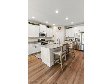 Welcome to this beautifully maintained 2019 single-family home on River Hall Country Club in Florida - for sale on GolfHomes.com, golf home, golf lot