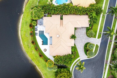 Perched on a rare, oversized lot at the end of a quiet on Boca Delray Golf and Country Club in Florida - for sale on GolfHomes.com, golf home, golf lot