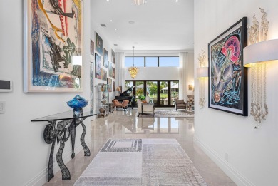 Perched on a rare, oversized lot at the end of a quiet on Boca Delray Golf and Country Club in Florida - for sale on GolfHomes.com, golf home, golf lot