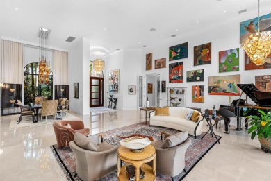 Perched on a rare, oversized lot at the end of a quiet on Boca Delray Golf and Country Club in Florida - for sale on GolfHomes.com, golf home, golf lot