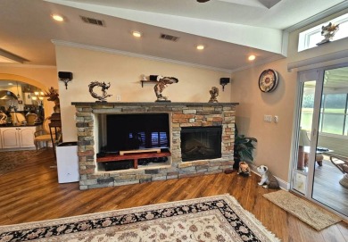 This home is located on leased land in a 55+ resort-style MH on Big Cypress Golf and Country Club in Florida - for sale on GolfHomes.com, golf home, golf lot