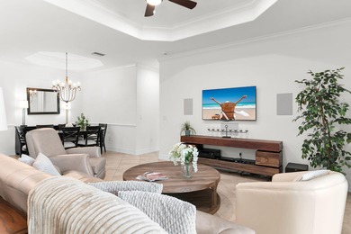 This open floor plan is light and bright with 2 bedrooms plus a on The Golf Club At Fiddlers Creek in Florida - for sale on GolfHomes.com, golf home, golf lot