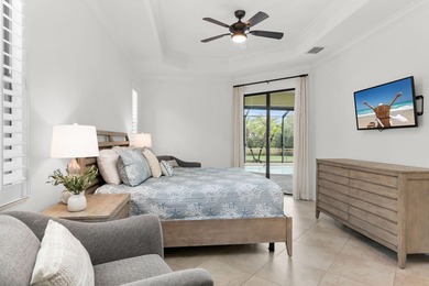 This open floor plan is light and bright with 2 bedrooms plus a on The Golf Club At Fiddlers Creek in Florida - for sale on GolfHomes.com, golf home, golf lot