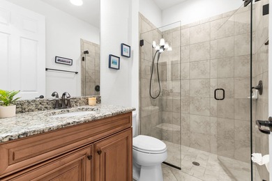 This open floor plan is light and bright with 2 bedrooms plus a on The Golf Club At Fiddlers Creek in Florida - for sale on GolfHomes.com, golf home, golf lot