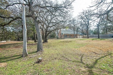 The property at 313 Comanche Drive in Lake Kiowa, Texas, is a on Lake Kiowa Golf Course in Texas - for sale on GolfHomes.com, golf home, golf lot