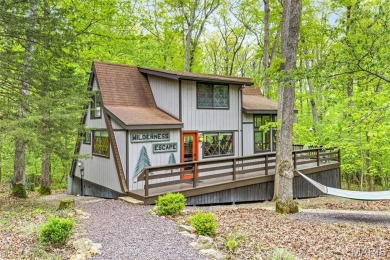 Say hello to summer at Wilderness Escape, a charming Innsbrook on Innsbrook Resort Golf Course in Missouri - for sale on GolfHomes.com, golf home, golf lot