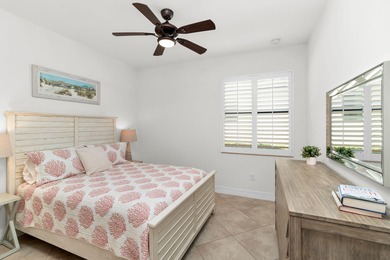 This open floor plan is light and bright with 2 bedrooms plus a on The Golf Club At Fiddlers Creek in Florida - for sale on GolfHomes.com, golf home, golf lot