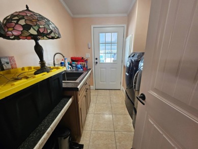This home is located on leased land in a 55+ resort-style MH on Big Cypress Golf and Country Club in Florida - for sale on GolfHomes.com, golf home, golf lot