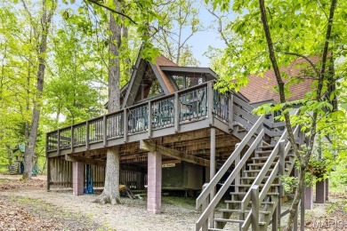 Say hello to summer at Wilderness Escape, a charming Innsbrook on Innsbrook Resort Golf Course in Missouri - for sale on GolfHomes.com, golf home, golf lot