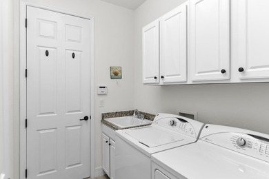 This open floor plan is light and bright with 2 bedrooms plus a on The Golf Club At Fiddlers Creek in Florida - for sale on GolfHomes.com, golf home, golf lot