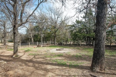 The property at 313 Comanche Drive in Lake Kiowa, Texas, is a on Lake Kiowa Golf Course in Texas - for sale on GolfHomes.com, golf home, golf lot