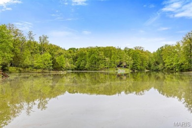 Say hello to summer at Wilderness Escape, a charming Innsbrook on Innsbrook Resort Golf Course in Missouri - for sale on GolfHomes.com, golf home, golf lot