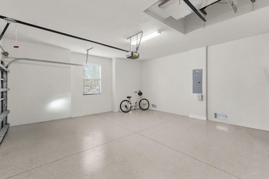 This open floor plan is light and bright with 2 bedrooms plus a on The Golf Club At Fiddlers Creek in Florida - for sale on GolfHomes.com, golf home, golf lot