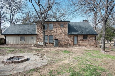 The property at 313 Comanche Drive in Lake Kiowa, Texas, is a on Lake Kiowa Golf Course in Texas - for sale on GolfHomes.com, golf home, golf lot