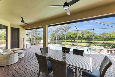 This open floor plan is light and bright with 2 bedrooms plus a on The Golf Club At Fiddlers Creek in Florida - for sale on GolfHomes.com, golf home, golf lot