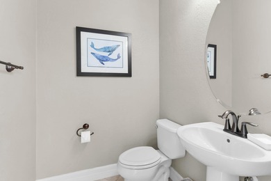 This open floor plan is light and bright with 2 bedrooms plus a on The Golf Club At Fiddlers Creek in Florida - for sale on GolfHomes.com, golf home, golf lot