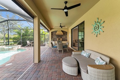 This open floor plan is light and bright with 2 bedrooms plus a on The Golf Club At Fiddlers Creek in Florida - for sale on GolfHomes.com, golf home, golf lot