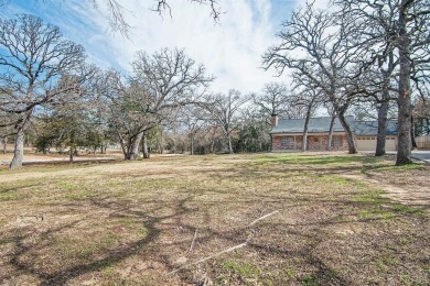 The property at 313 Comanche Drive in Lake Kiowa, Texas, is a on Lake Kiowa Golf Course in Texas - for sale on GolfHomes.com, golf home, golf lot