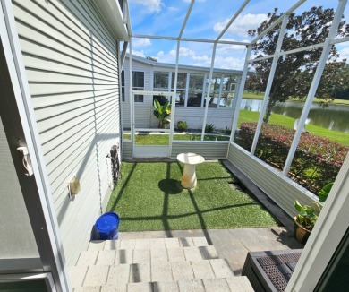 This home is located on leased land in a 55+ resort-style MH on Big Cypress Golf and Country Club in Florida - for sale on GolfHomes.com, golf home, golf lot