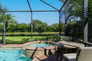 This open floor plan is light and bright with 2 bedrooms plus a on The Golf Club At Fiddlers Creek in Florida - for sale on GolfHomes.com, golf home, golf lot