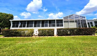 This home is located on leased land in a 55+ resort-style MH on Big Cypress Golf and Country Club in Florida - for sale on GolfHomes.com, golf home, golf lot