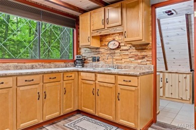 Say hello to summer at Wilderness Escape, a charming Innsbrook on Innsbrook Resort Golf Course in Missouri - for sale on GolfHomes.com, golf home, golf lot