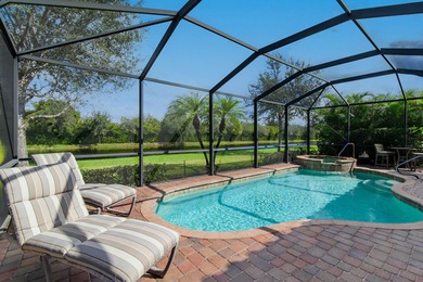 This open floor plan is light and bright with 2 bedrooms plus a on The Golf Club At Fiddlers Creek in Florida - for sale on GolfHomes.com, golf home, golf lot