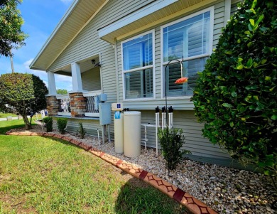 This home is located on leased land in a 55+ resort-style MH on Big Cypress Golf and Country Club in Florida - for sale on GolfHomes.com, golf home, golf lot