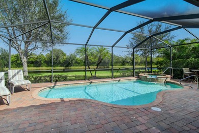 This open floor plan is light and bright with 2 bedrooms plus a on The Golf Club At Fiddlers Creek in Florida - for sale on GolfHomes.com, golf home, golf lot
