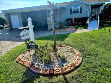 This home is located on leased land in a 55+ resort-style MH on Big Cypress Golf and Country Club in Florida - for sale on GolfHomes.com, golf home, golf lot