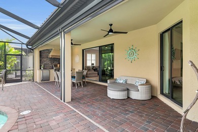 This open floor plan is light and bright with 2 bedrooms plus a on The Golf Club At Fiddlers Creek in Florida - for sale on GolfHomes.com, golf home, golf lot