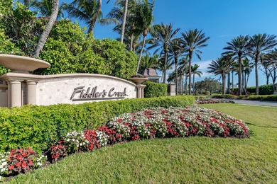 This open floor plan is light and bright with 2 bedrooms plus a on The Golf Club At Fiddlers Creek in Florida - for sale on GolfHomes.com, golf home, golf lot