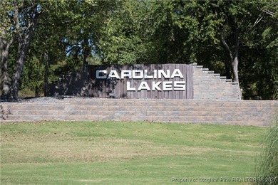 GORGEOUS FIVE-BEDROOM HOME IN CAROLINA LAKES! Don't miss out on on Carolina Lakes Country Club in North Carolina - for sale on GolfHomes.com, golf home, golf lot