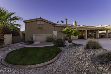 Welcome to your dream home!  This spacious property offers the on London Bridge Golf Course in Arizona - for sale on GolfHomes.com, golf home, golf lot