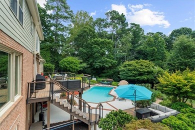 Nestled on a private, one-acre lot just moments from Highway 400 on Cherokee Town and Country Club in Georgia - for sale on GolfHomes.com, golf home, golf lot