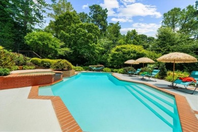 Nestled on a private, one-acre lot just moments from Highway 400 on Cherokee Town and Country Club in Georgia - for sale on GolfHomes.com, golf home, golf lot