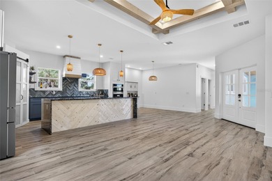 NEW CONSTRUCTION! JUST COMPLETED DOUBLE LOT 3 BEDROOM, 3 BATH, 2 on Riverwood Golf Club in Florida - for sale on GolfHomes.com, golf home, golf lot