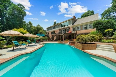Nestled on a private, one-acre lot just moments from Highway 400 on Cherokee Town and Country Club in Georgia - for sale on GolfHomes.com, golf home, golf lot