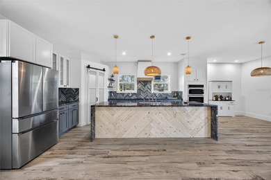 NEW CONSTRUCTION! JUST COMPLETED DOUBLE LOT 3 BEDROOM, 3 BATH, 2 on Riverwood Golf Club in Florida - for sale on GolfHomes.com, golf home, golf lot