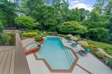 Nestled on a private, one-acre lot just moments from Highway 400 on Cherokee Town and Country Club in Georgia - for sale on GolfHomes.com, golf home, golf lot